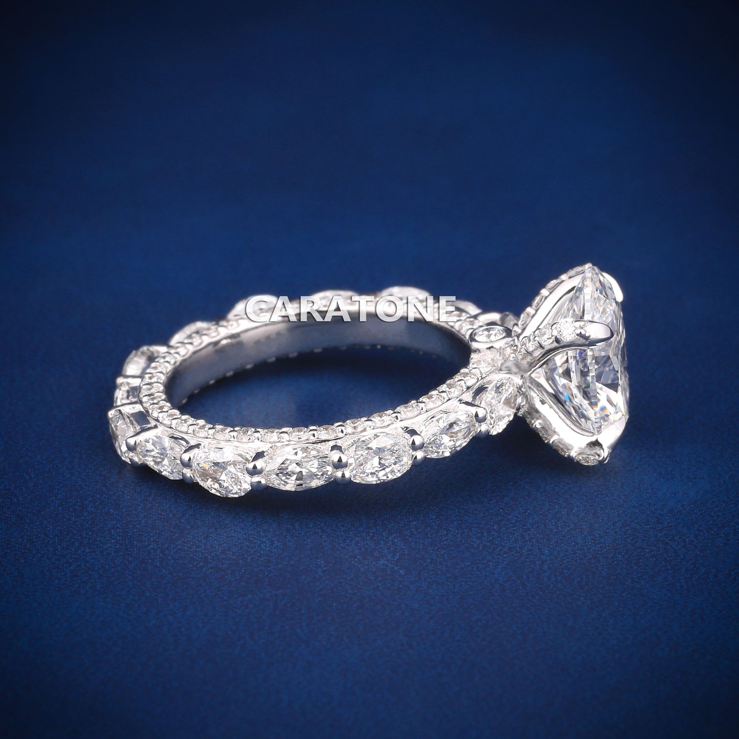 Oval cut diamond engagement ring in white gold with full halo and side stones