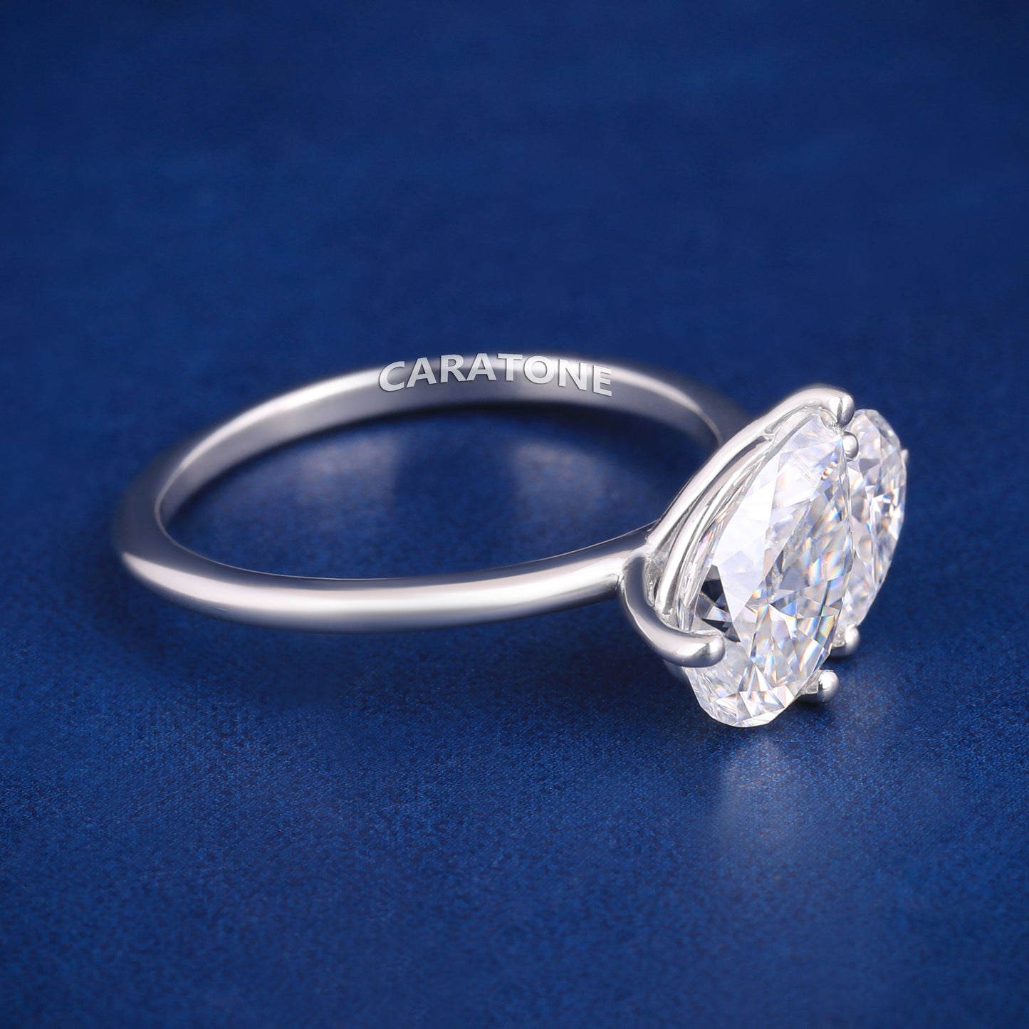 Pear shaped diamond silver engagement ring for women