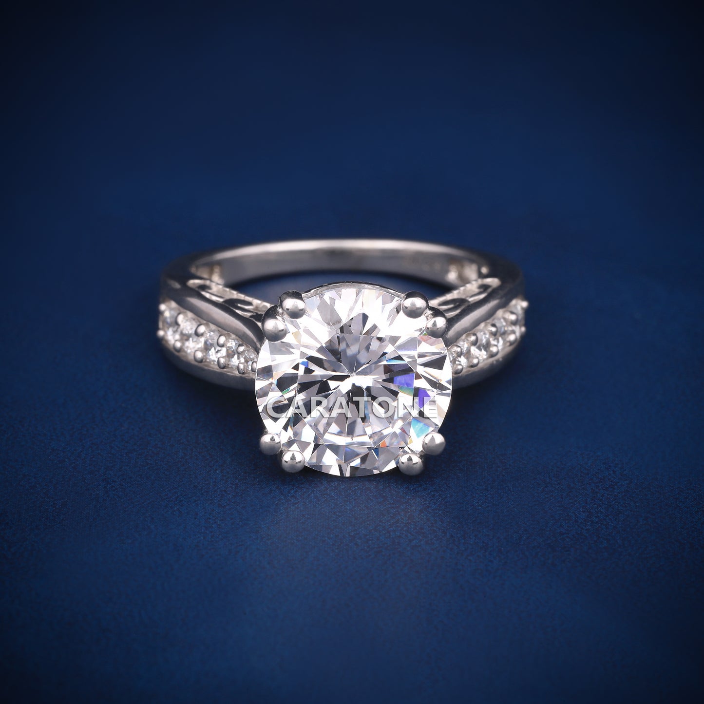 Round cut engagement ring with diamond tester passed