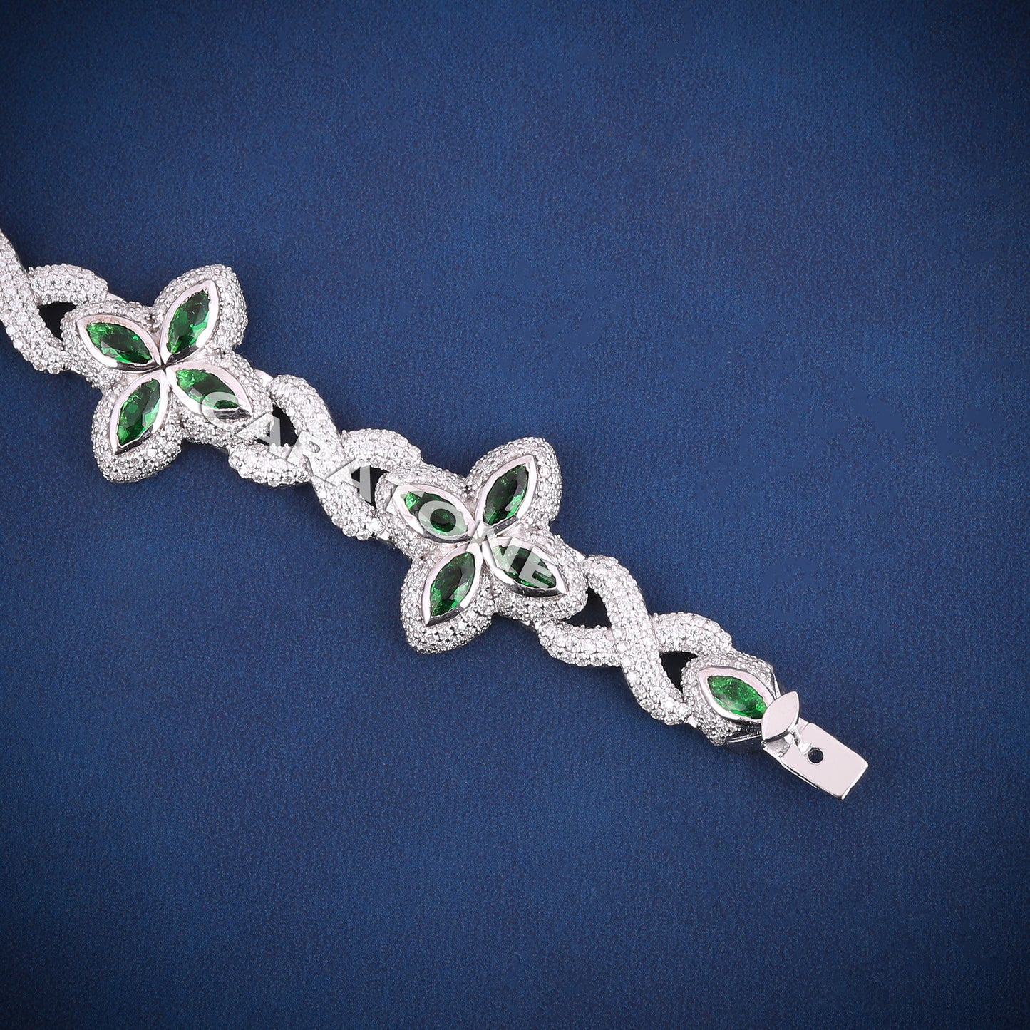 Infinity style green gemstone diamond clover bracelet