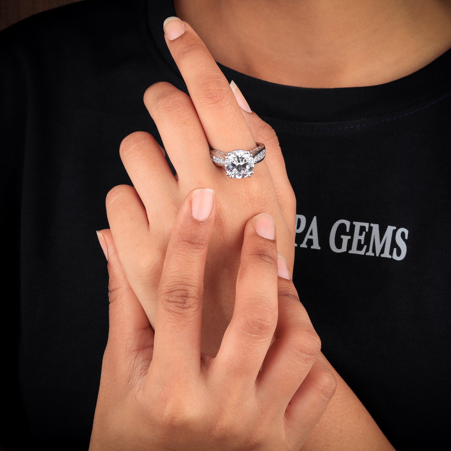 Round cut engagement ring with diamond tester passed