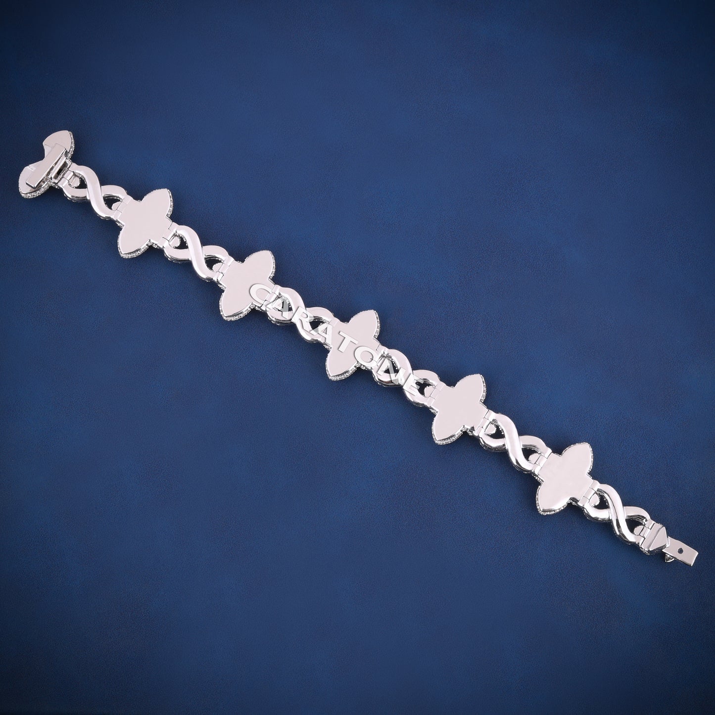 Infinity style green gemstone diamond clover bracelet