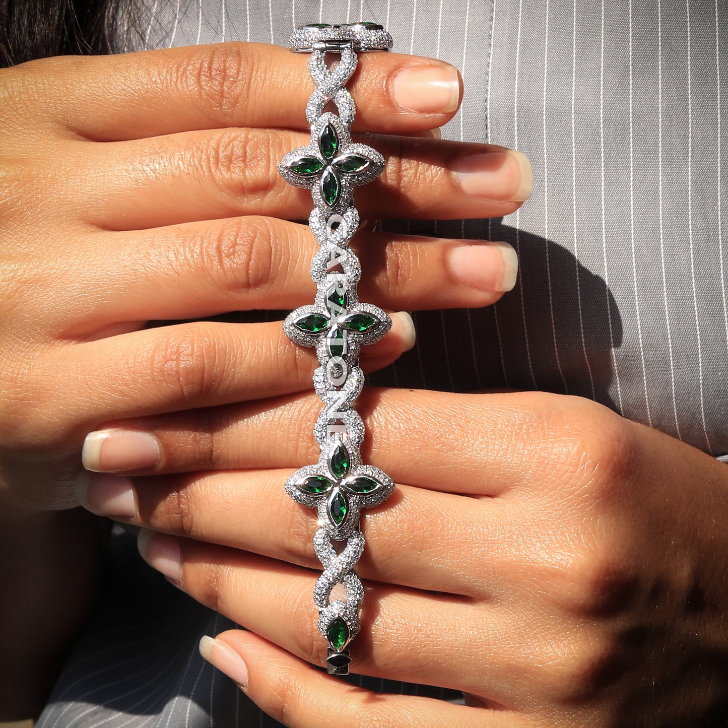 Infinity style green gemstone diamond clover bracelet