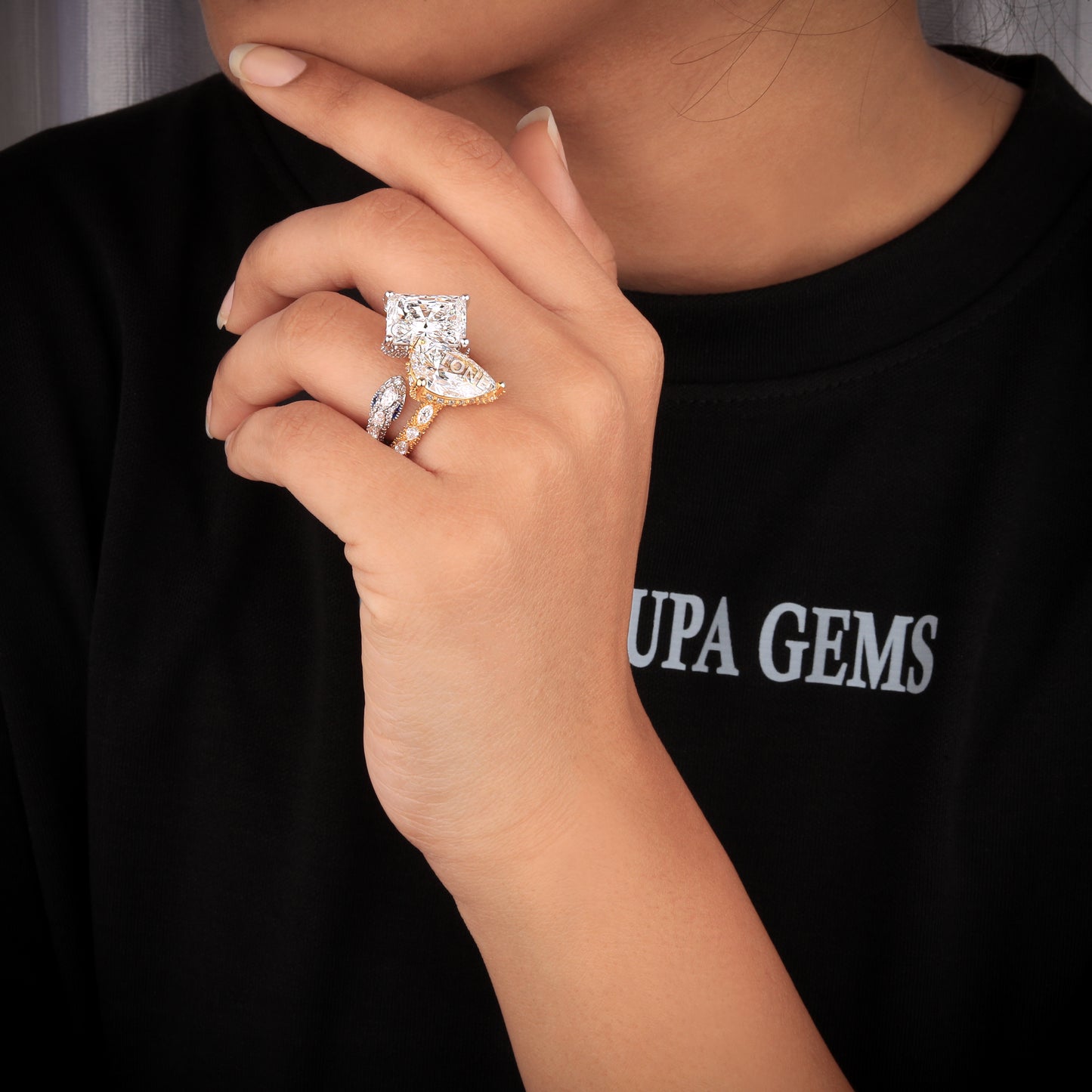 Pear and solitaire diamond wedding ring with diamond tester passed