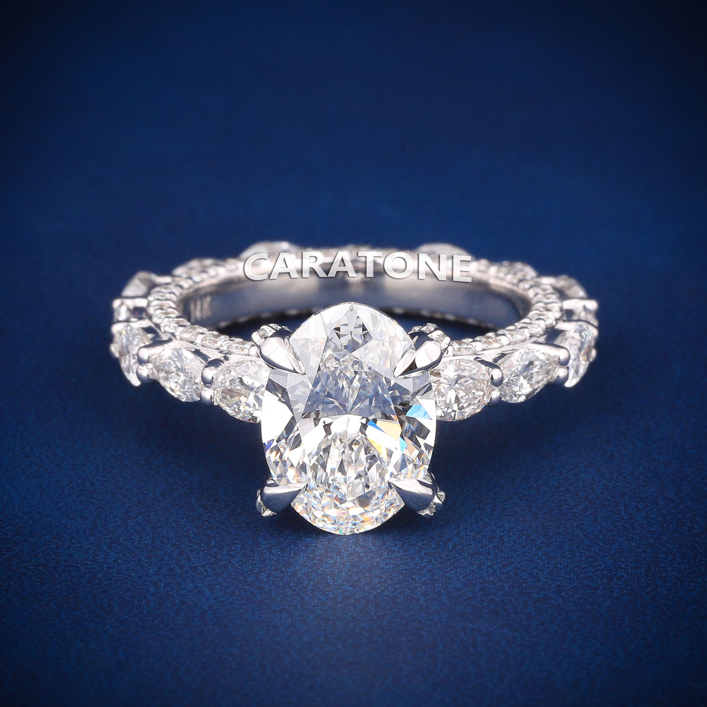 Oval cut diamond engagement ring in white gold with full halo and side stones
