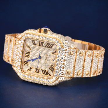 Hip hop full iced out branded watch in gold tone with black roman numerals in it