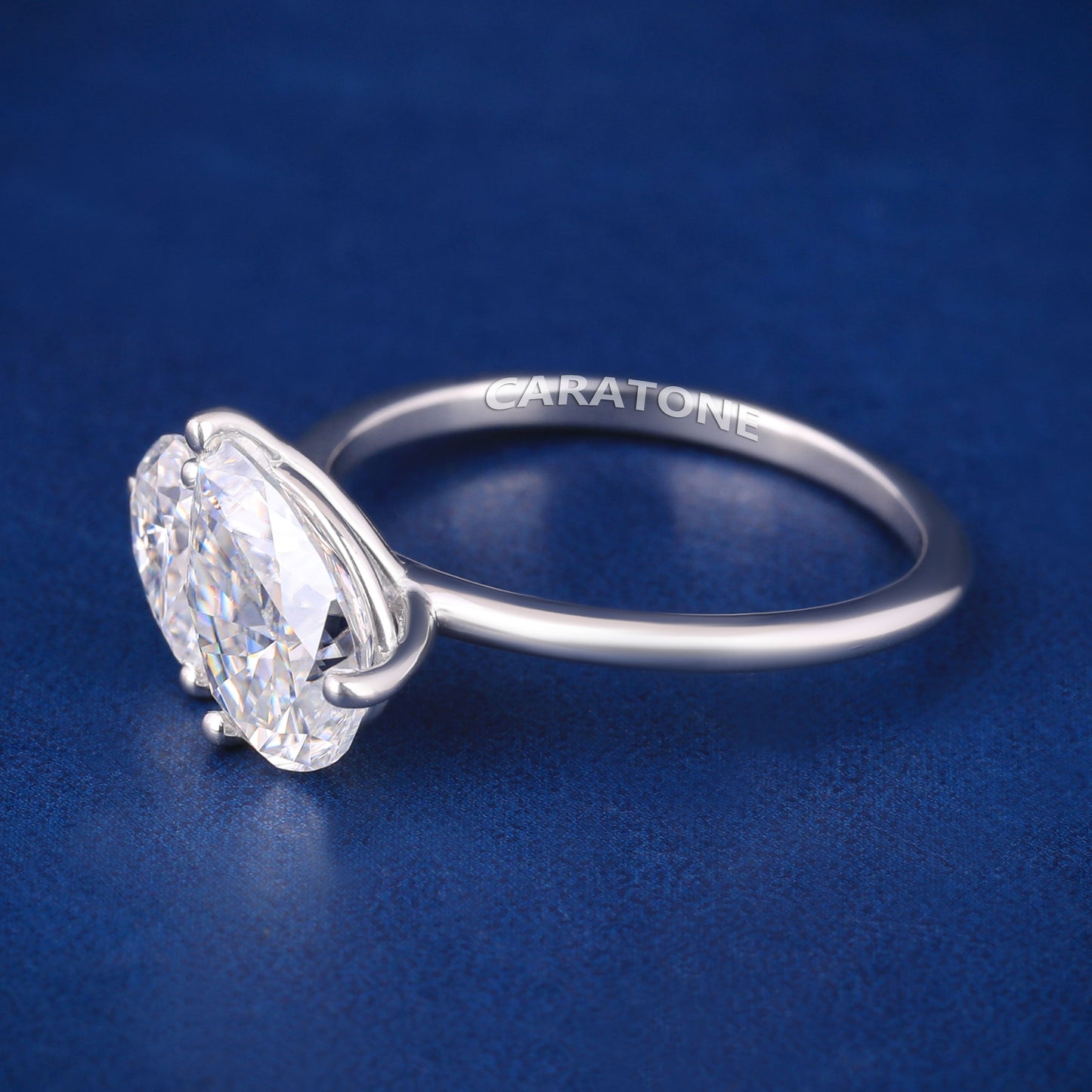 Pear shaped diamond silver engagement ring for women