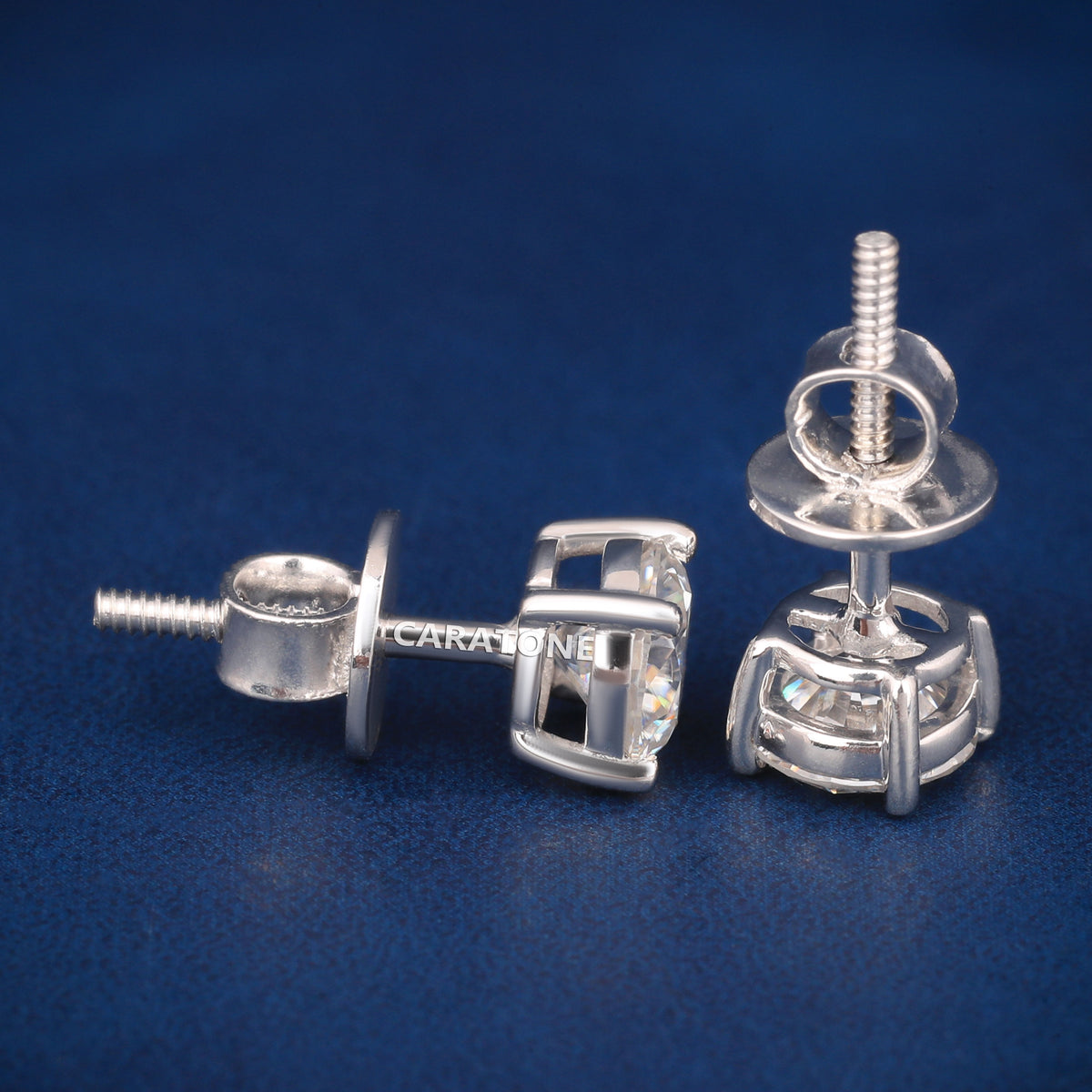 Round Brilliant Cut Diamond Stud Earrings in 18K White Gold with Four-Prong Setting and Screw-Back Closure