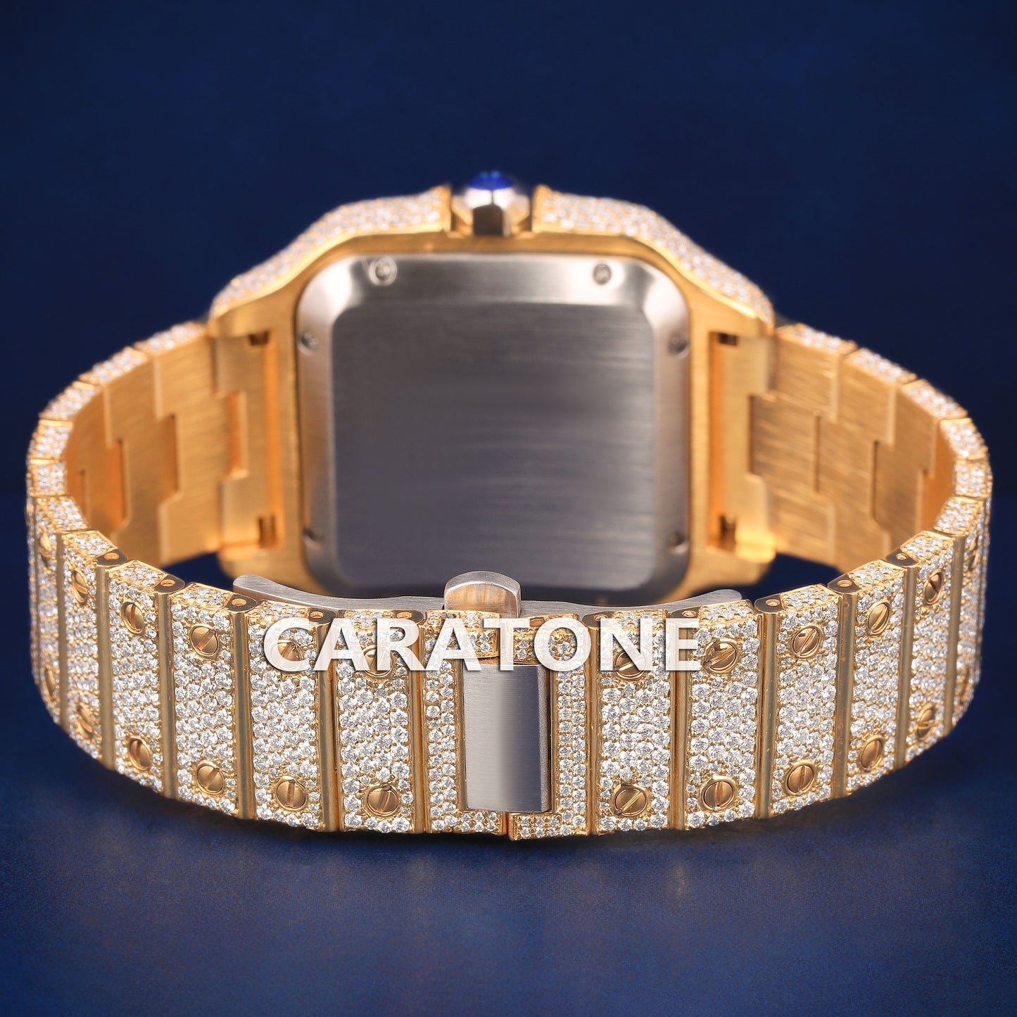 Hip hop full iced out branded watch in gold tone with black roman numerals in it