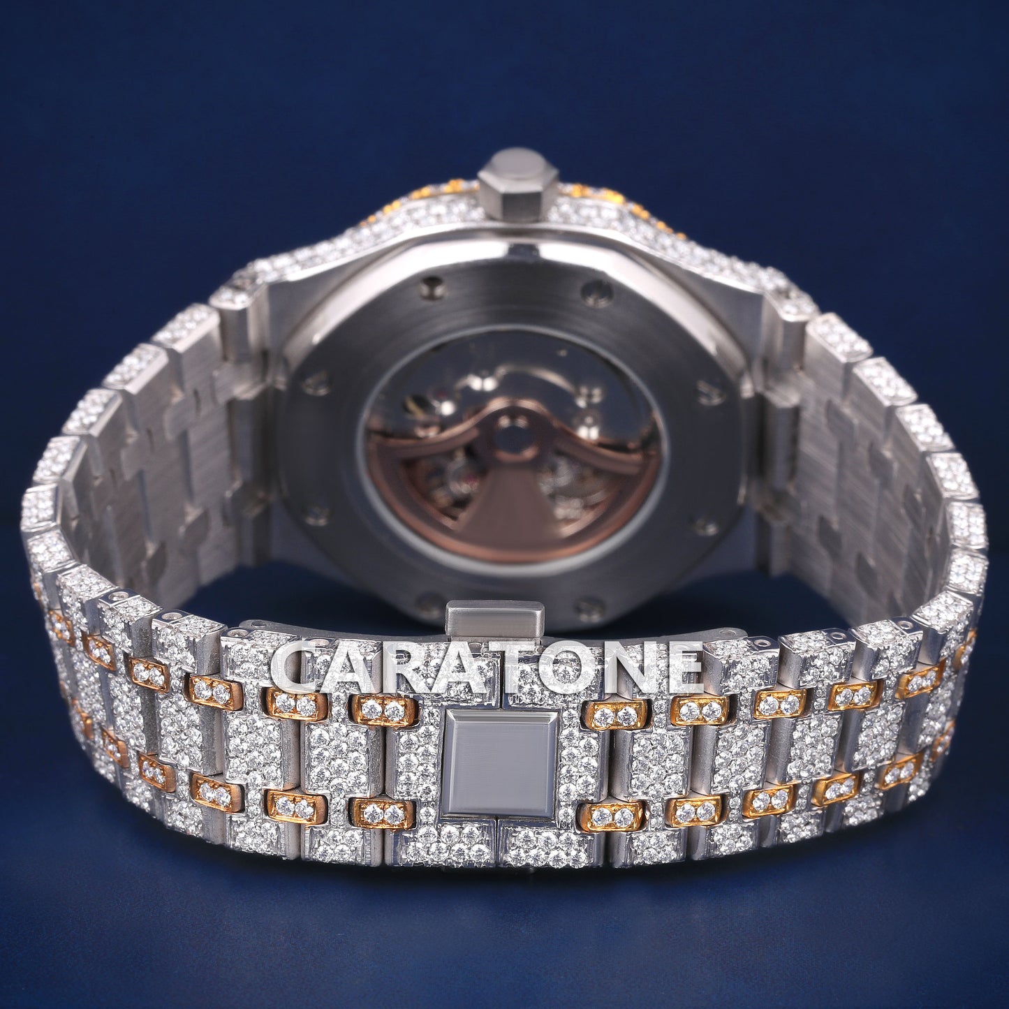 Full iced out hip hop branded watch in two tone and it is of D VVS clarity