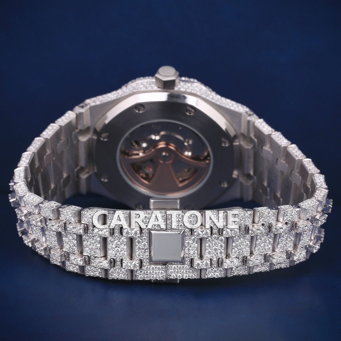 Full iced out hip hop branded watch in white tone with black arabic numerals and diamond tester passed