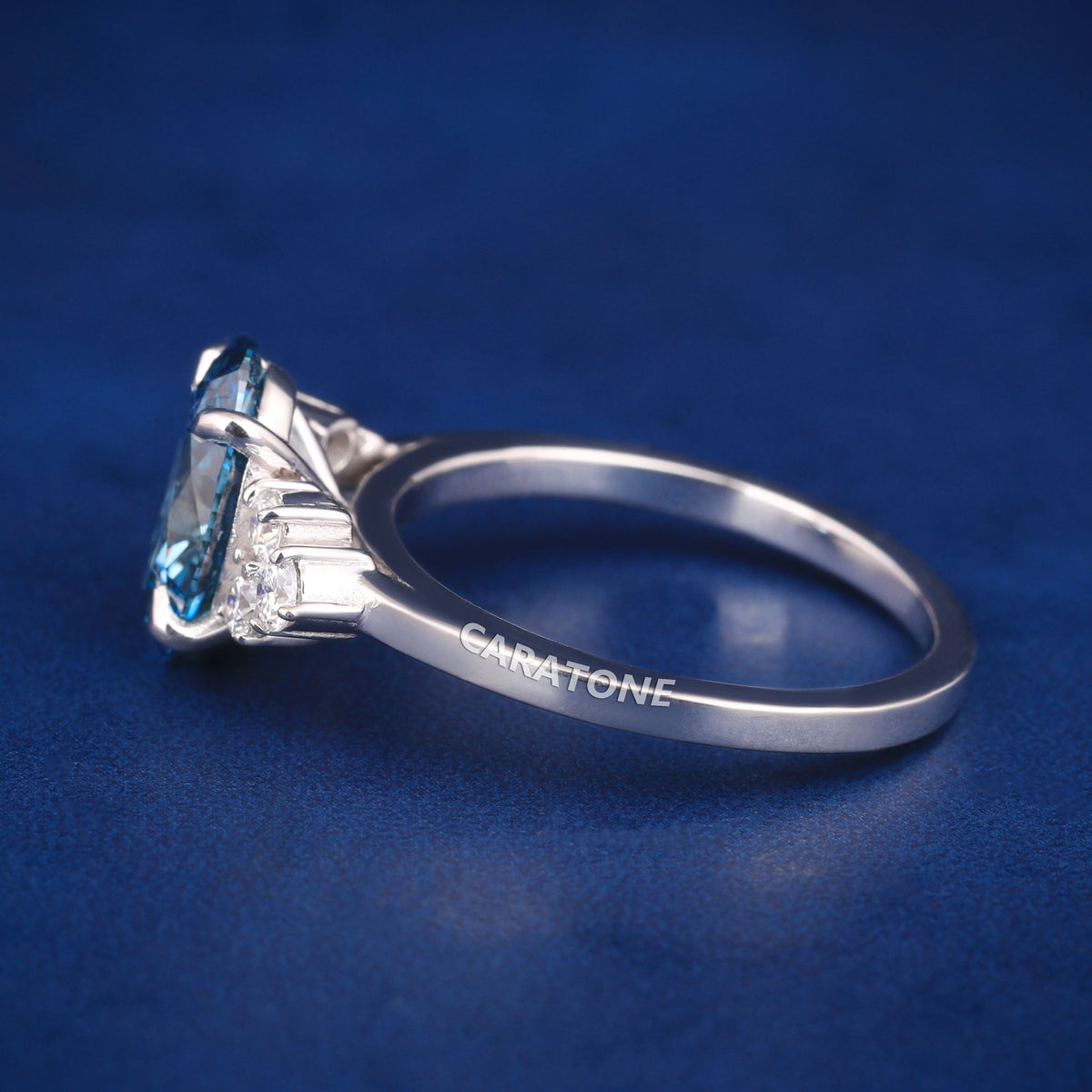 Unique Luxury Blue Gemstone Ring with Sparkling Diamond Details