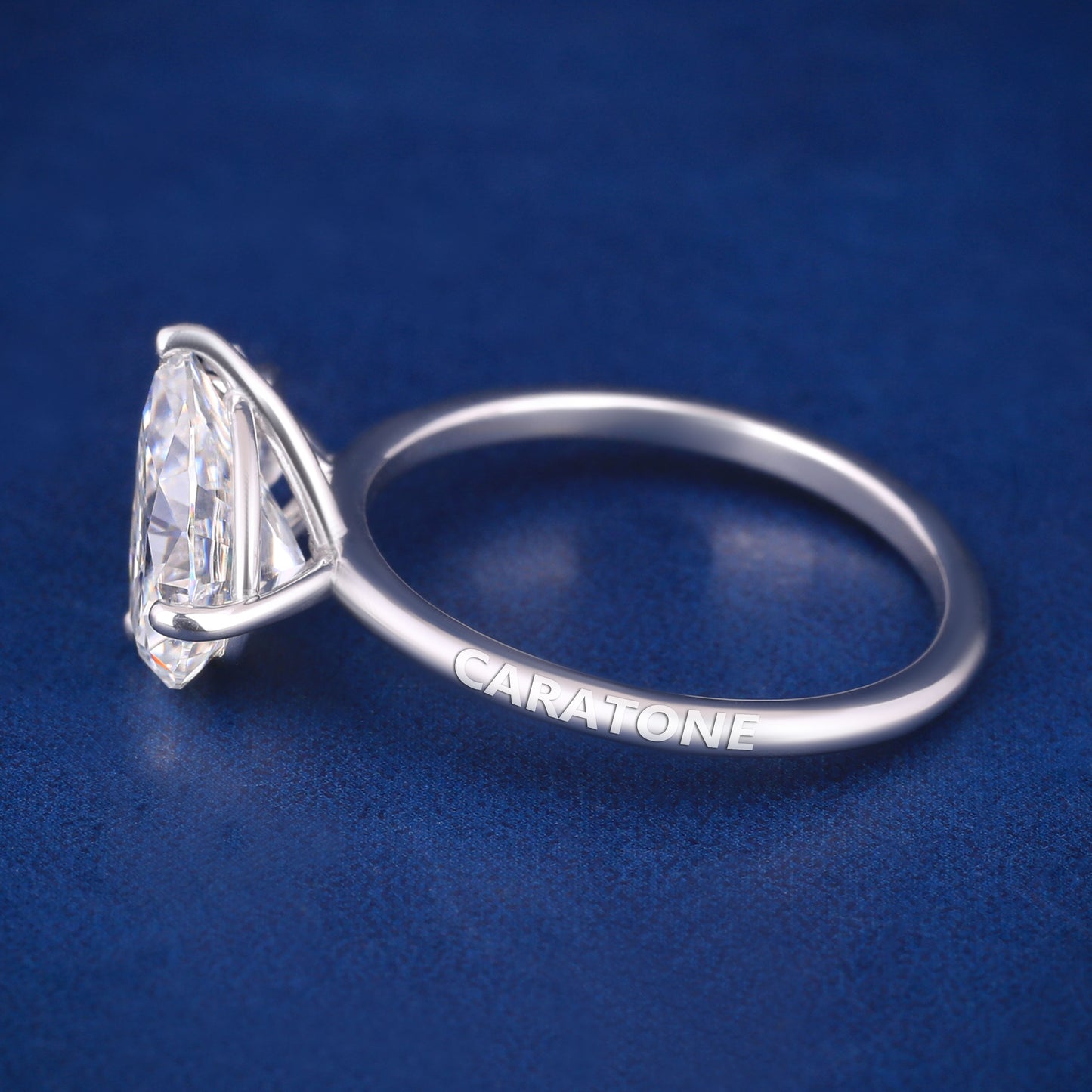 Pear shaped diamond silver engagement ring for women