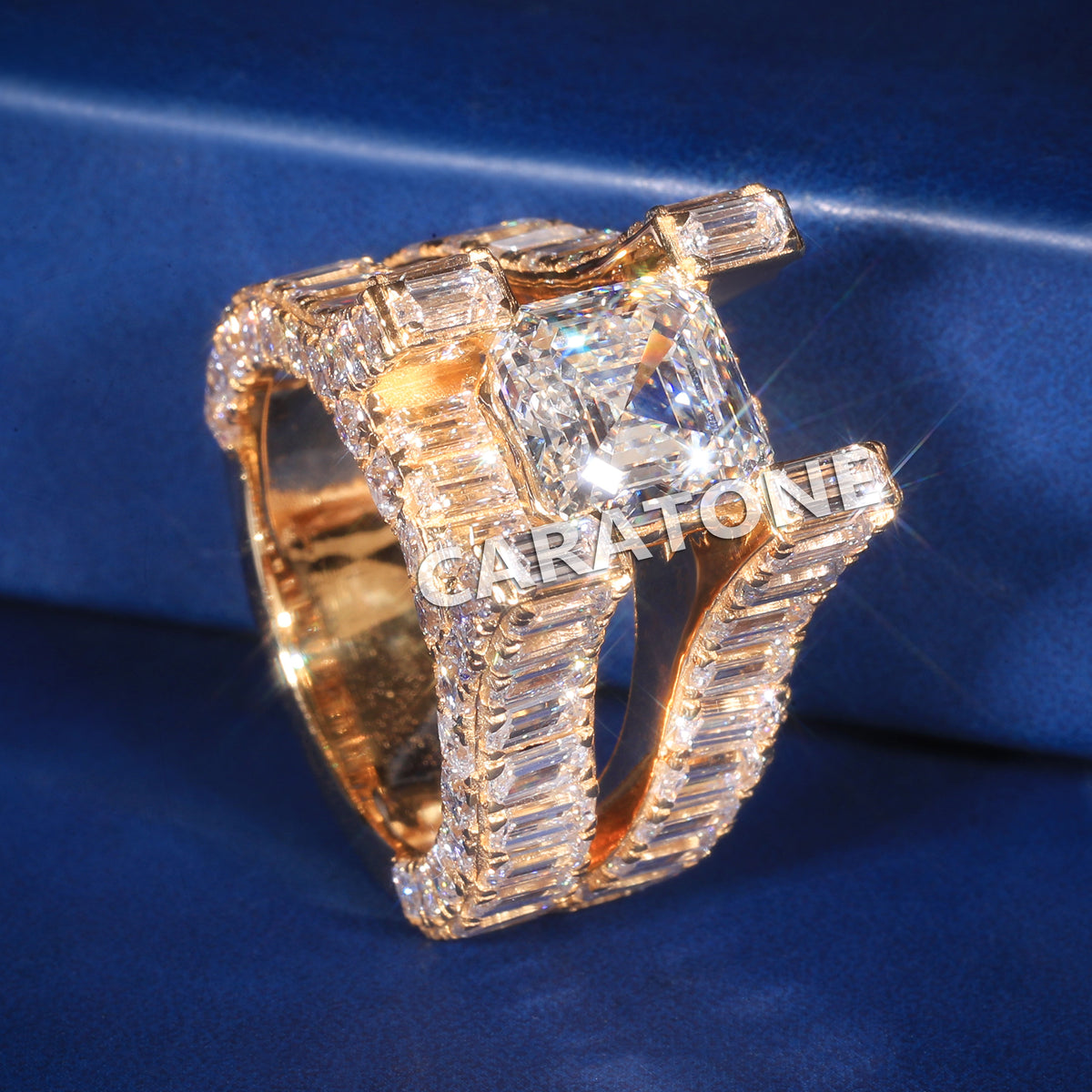Premium Emerald Cut Solitaire Ring With Baguette Side Stones And Yellow Gold Setting