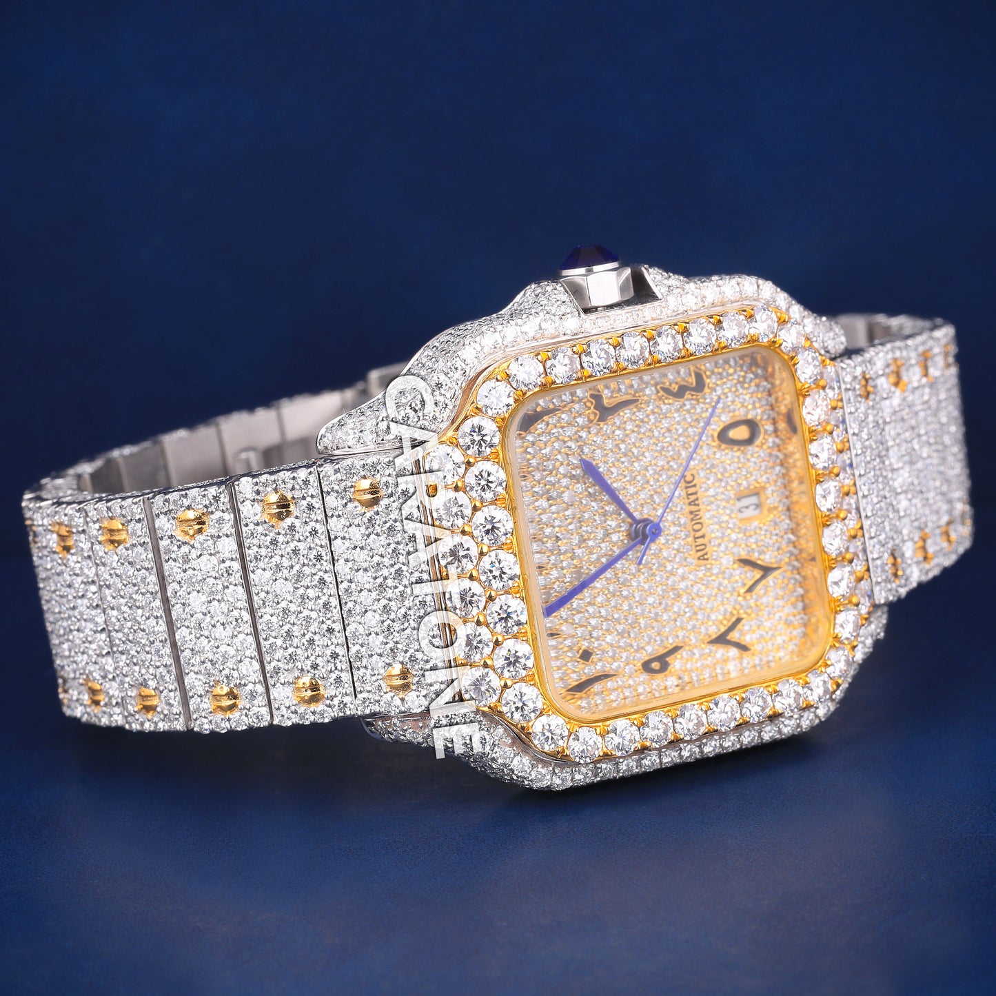 Full iced out hip hop branded watch in two tone with black arabic numerals in dial and it is of D VVS clarity