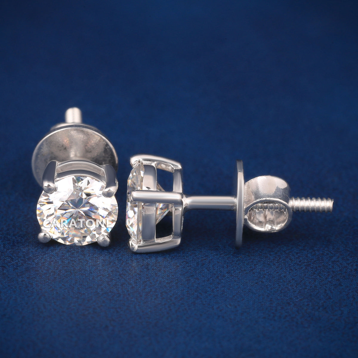 Round Brilliant Cut Diamond Stud Earrings in 18K White Gold with Four-Prong Setting and Screw-Back Closure