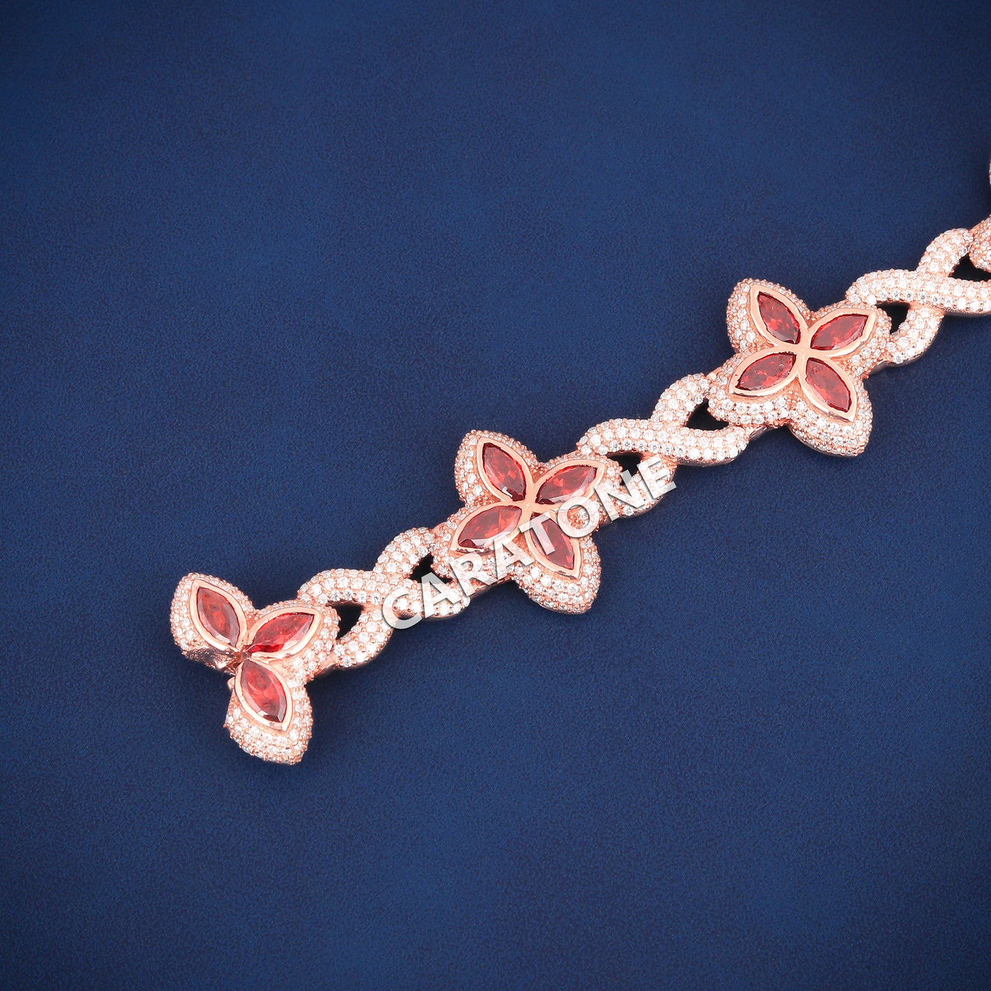 Rose Gold Clover Bracelet with Red Marquise Gemstone and Full Iced Look for Men in Hip Hop Luxury Style
