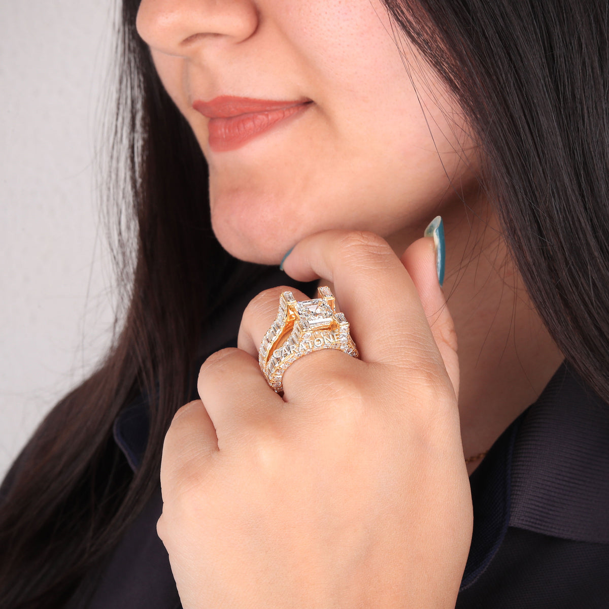 Premium Emerald Cut Solitaire Ring With Baguette Side Stones And Yellow Gold Setting