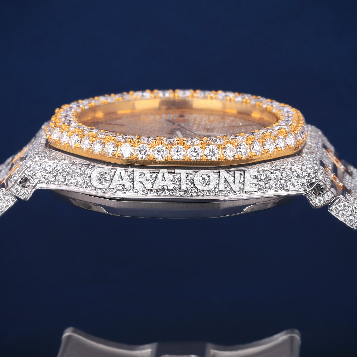 Full iced out hip hop branded watch in two tone and it is of D VVS clarity