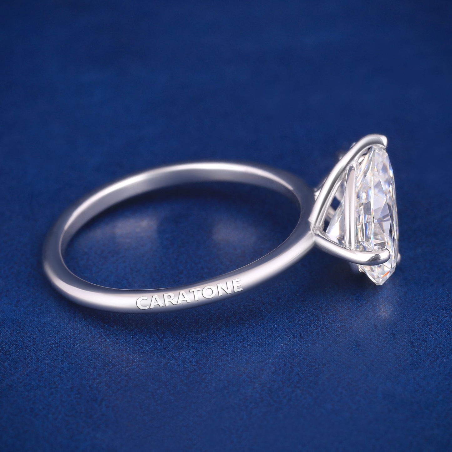 Pear shaped diamond silver engagement ring for women