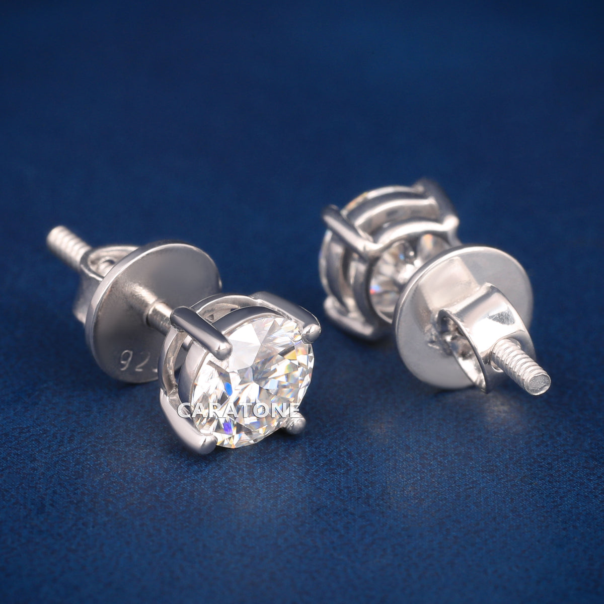 Round Brilliant Cut Diamond Stud Earrings in 18K White Gold with Four-Prong Setting and Screw-Back Closure