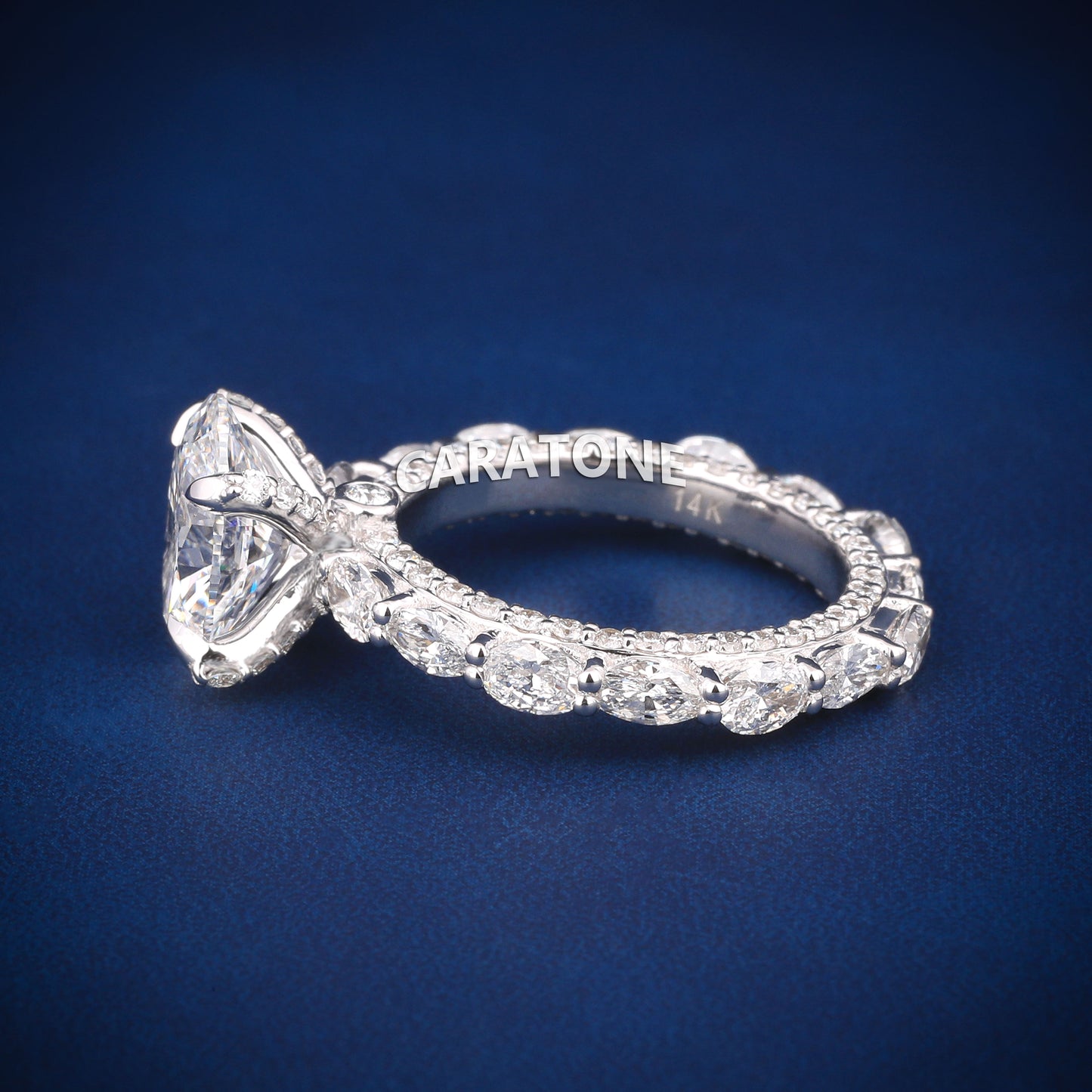 Oval cut diamond engagement ring in white gold with full halo and side stones
