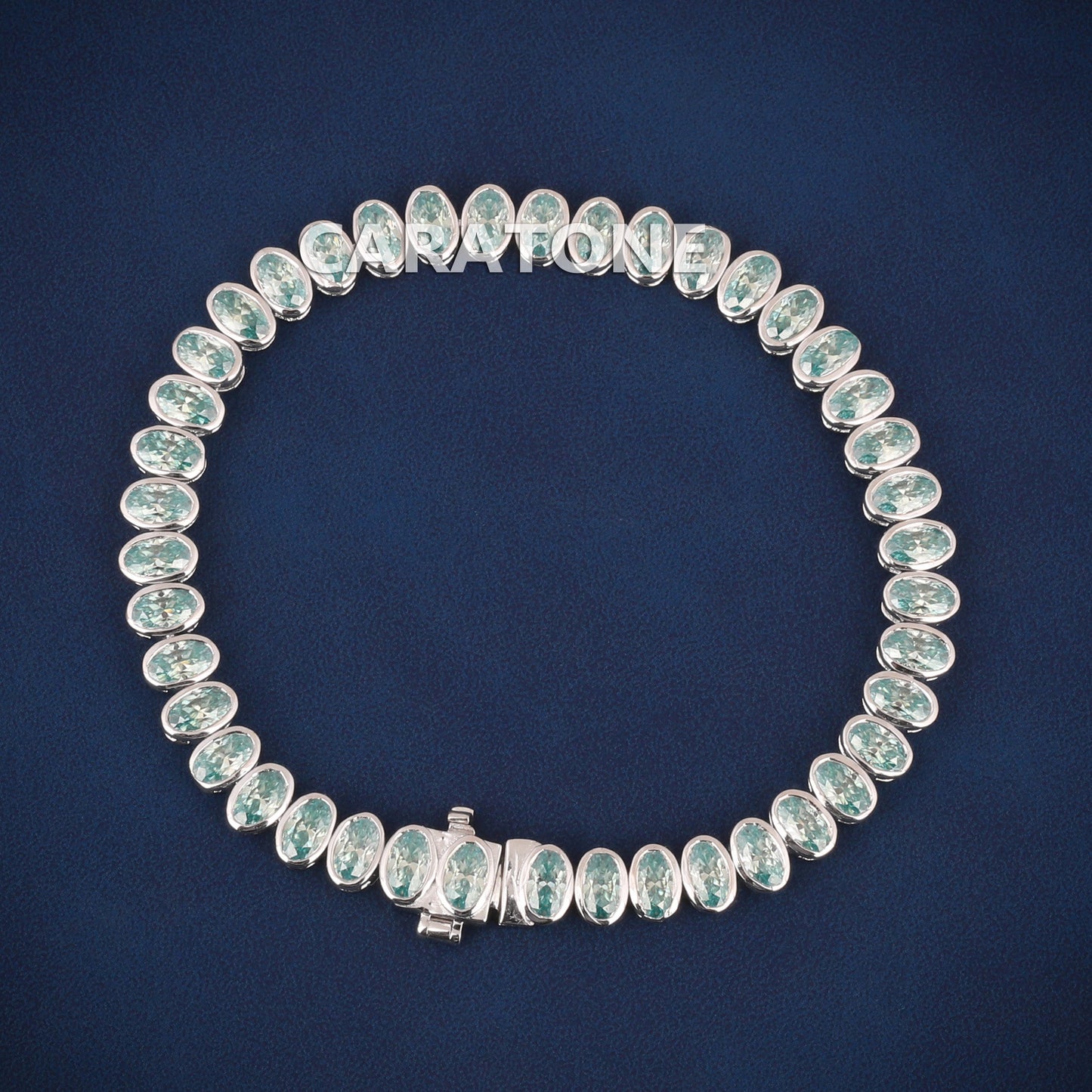 Luxury White Gold Tennis Bracelet with Oval Cut Green Stones for Womens Elegant Style