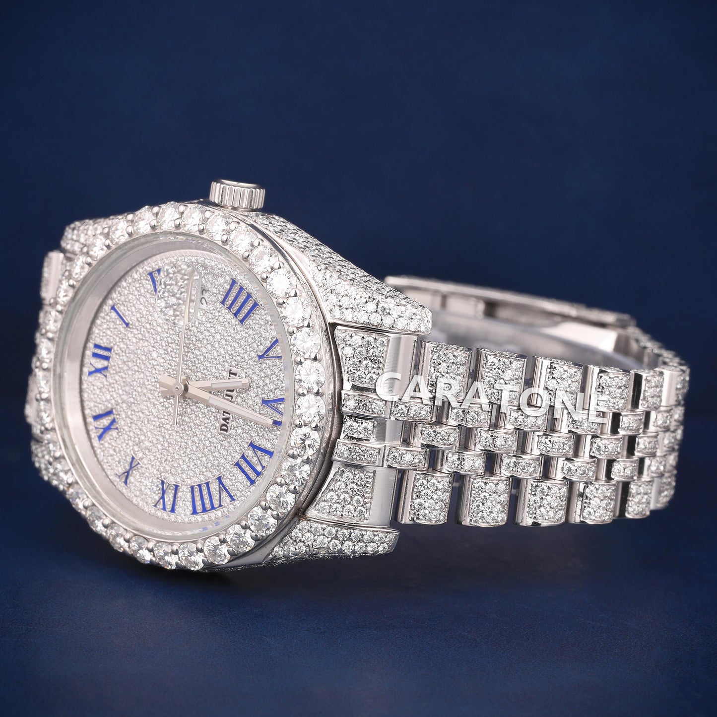 Full iced out Hip hop branded watch with white tone and Blue Roman numerals in it