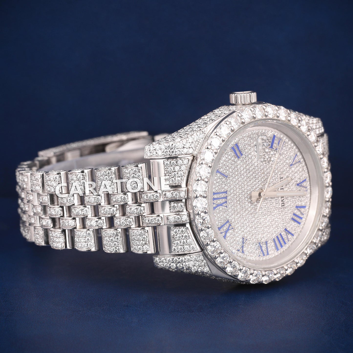 Full iced out Hip hop branded watch with white tone and Blue Roman numerals in it