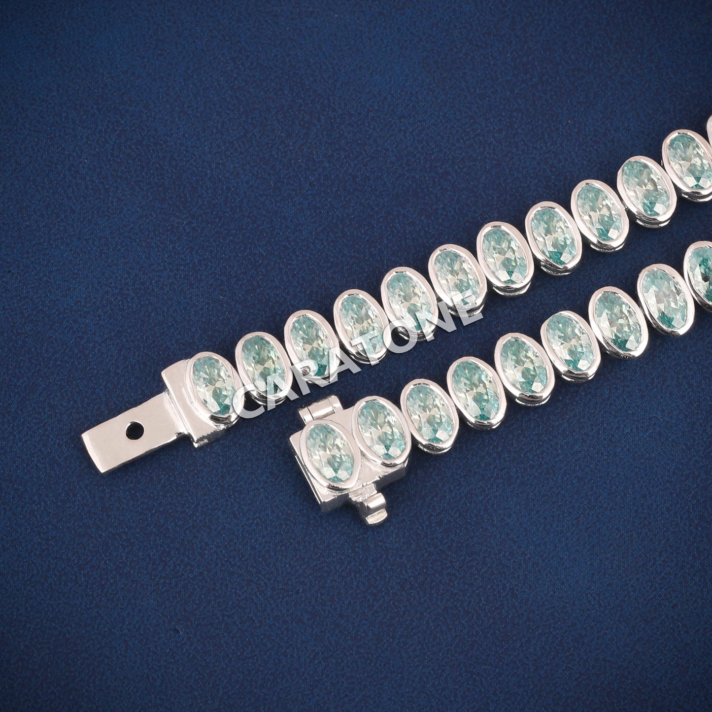 Luxury White Gold Tennis Bracelet with Oval Cut Green Stones for Womens Elegant Style