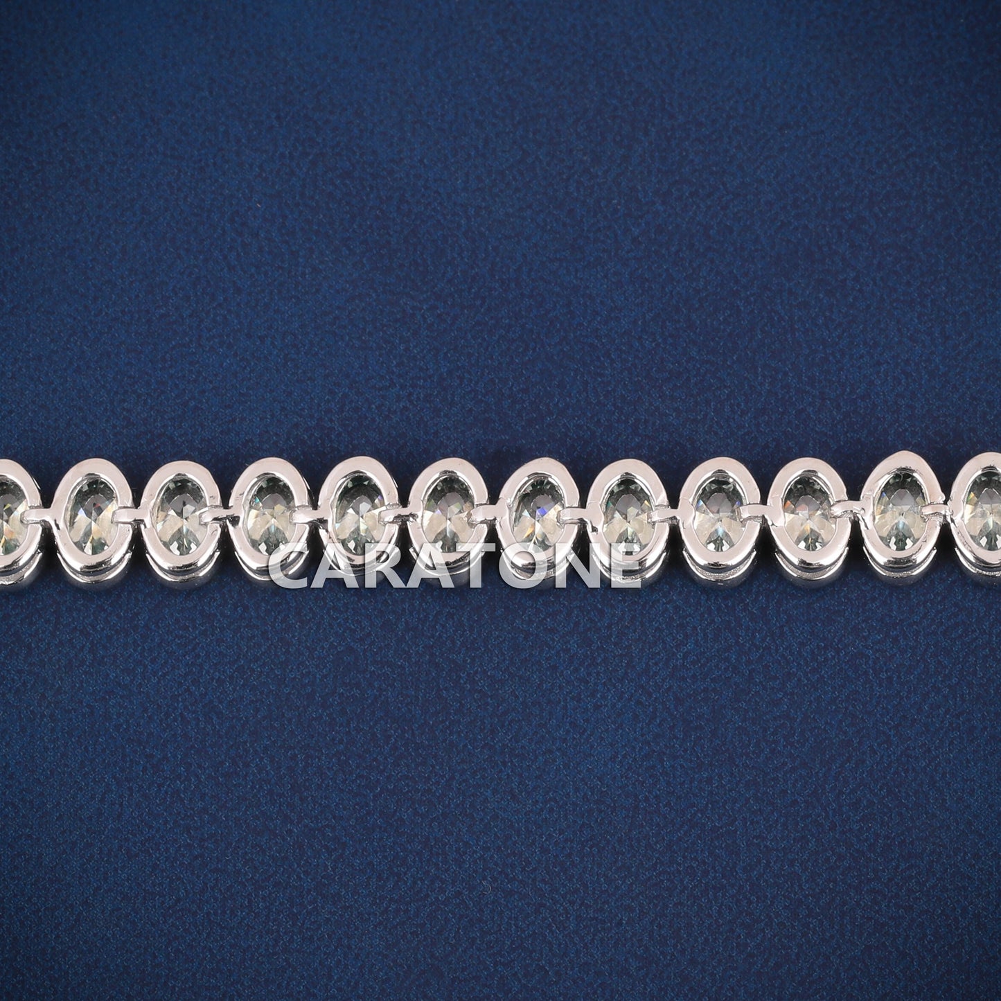 Luxury White Gold Tennis Bracelet with Oval Cut Green Stones for Womens Elegant Style