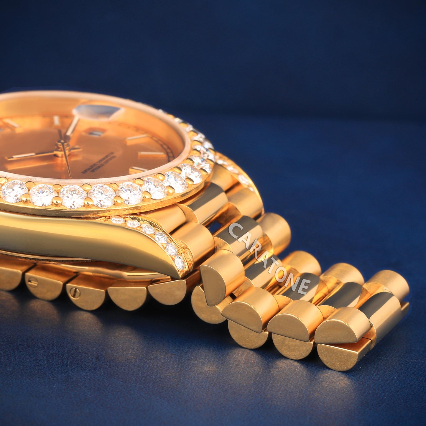 Half iced out without dial Hip hop branded watch in gold tone with D VVS clarity