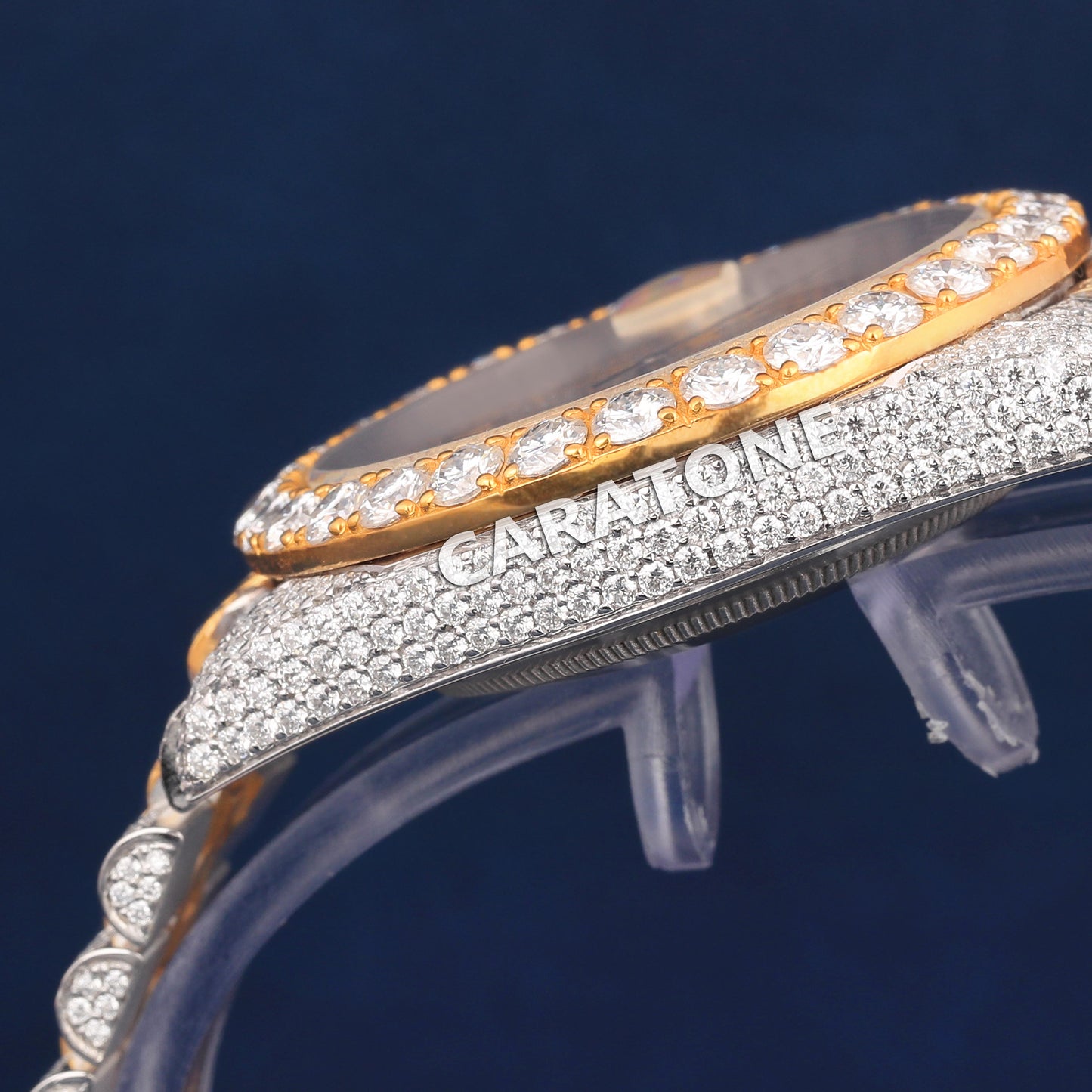 Full iced out Hip hop branded watch in two tone with Arabic numerals and Diamond tester passed
