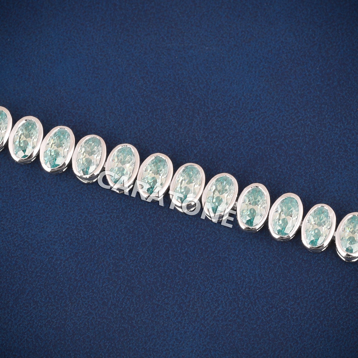 Luxury White Gold Tennis Bracelet with Oval Cut Green Stones for Womens Elegant Style