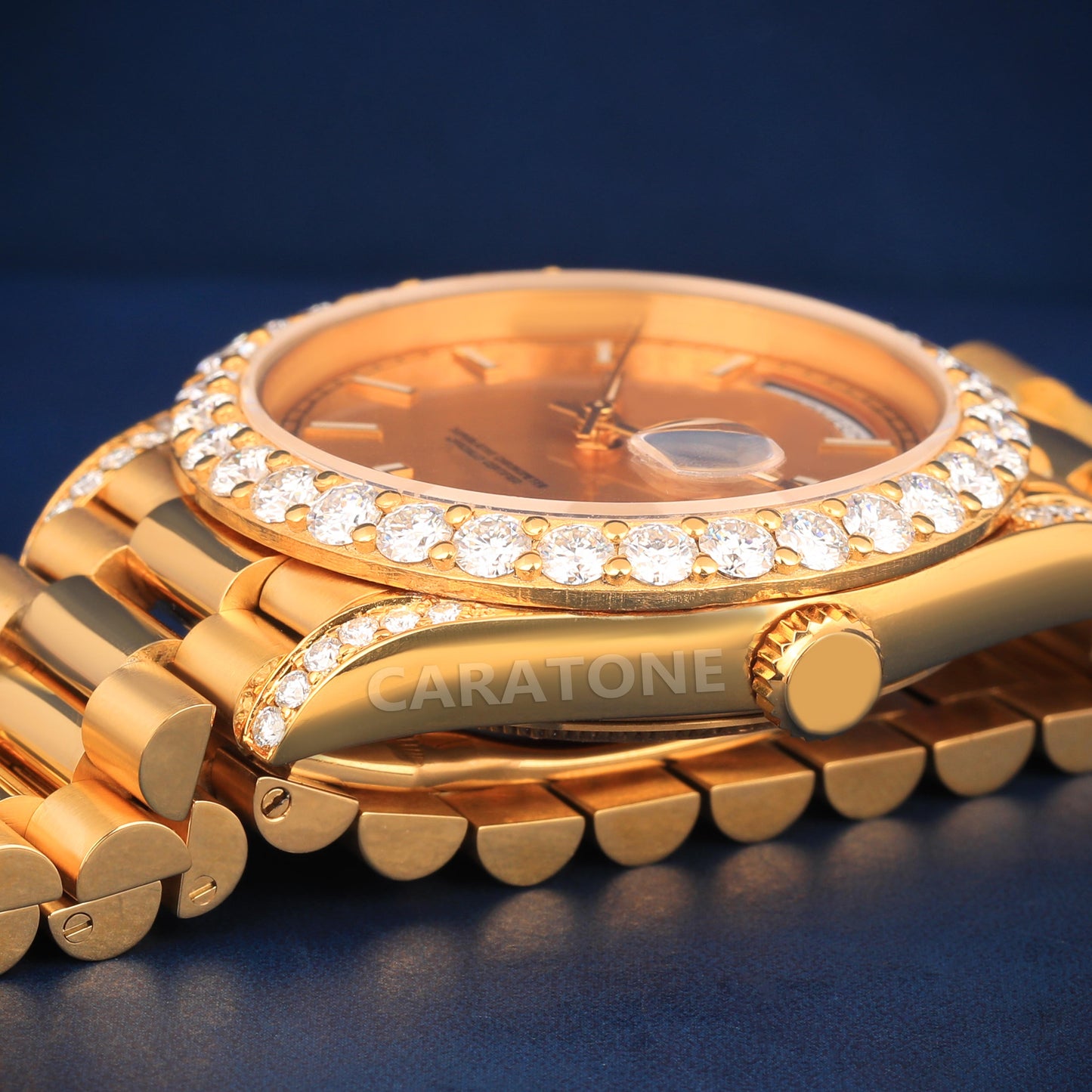 Half iced out without dial Hip hop branded watch in gold tone with D VVS clarity