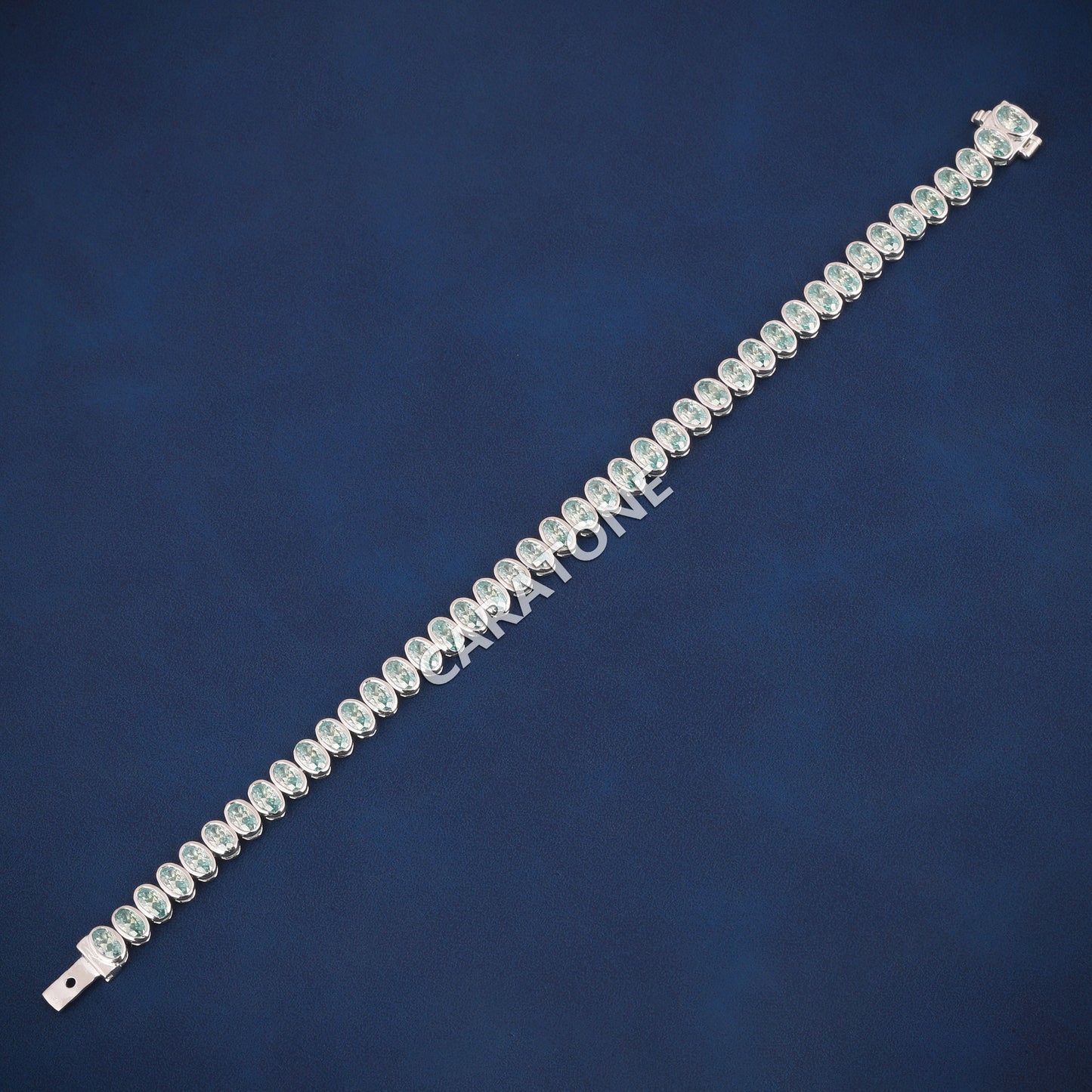 Luxury White Gold Tennis Bracelet with Oval Cut Green Stones for Womens Elegant Style